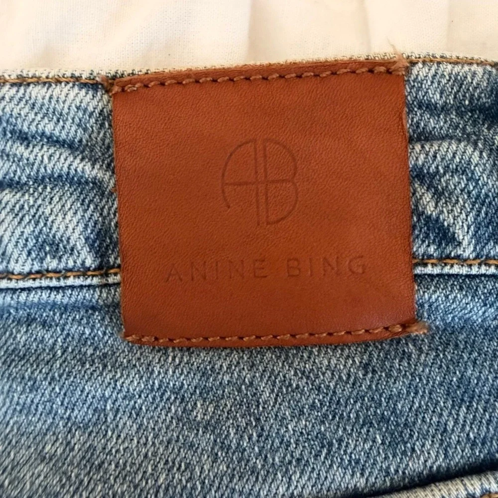 Anine Bing‎ High Rise Flare Jeans Light Wash Blue Raw Hem Size 24 Button Fly